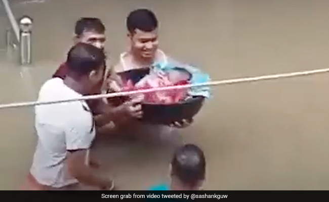 Video: Father Carries Baby In Waist-Deep Water In Flood-Hit Assam