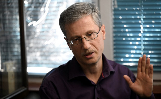 Fired Over Posts On Ukraine War, Russian Lecturer Fights For His Rights