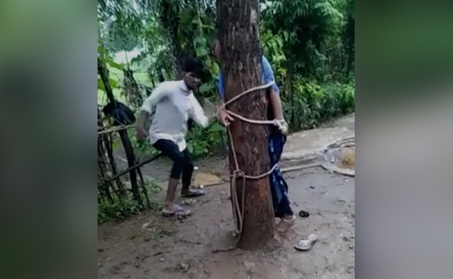 Video: Woman Tied To Tree, Thrashed After Husband Sees Her With Friend