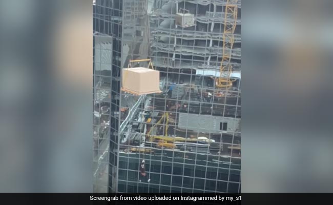 Watch: Viral Video Shows Worker Dangling From Crane