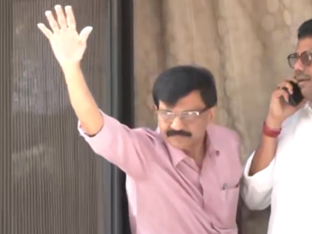 Sena's Sanjay Raut Waves At Supporters As Probe Agency Raids His Home