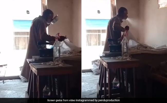Viral Video Shows Man Sprinkling Water From Mouth While Ironing Clothes