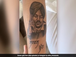Murdered Singer Sidhu Moose Wala's Father Gets Son's Face Tattooed On Arm Murdered Singer Sidhu Moose Wala's Father Gets Son's Face Tattooed On Arm