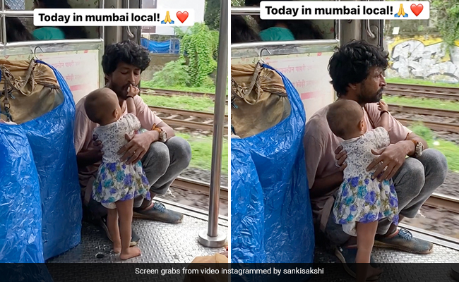 मुंबई लोकल के गेट पर बैठे पिता को अपने हाथों से फल खिला रही थी छोटी बच्ची, Video देख भावुक हुए लोग