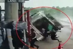 Caught On Camera: Ambulance Skids, Rams Into Toll Booth Caught On Camera: Ambulance Skids, Rams Into Toll Booth