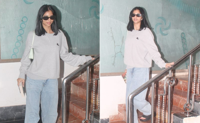 Suhana Khan Keeps It Cosy In A Grey Sweatshirt, Blue Jeans And Plaform Sandals