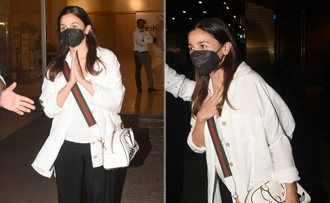 Alia Bhatt's Baby Bump Makes A Debut In Cool Casuals And A Rs 2.3 Lakh Gucci X Adidas Sling Bag At The Airport