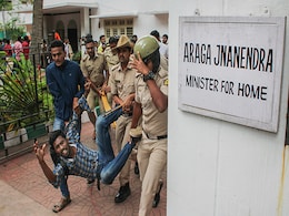 Protesters Barge Into Karnataka Minister's Home, Dragged Out By Cops Protesters Barge Into Karnataka Minister's Home, Dragged Out By Cops