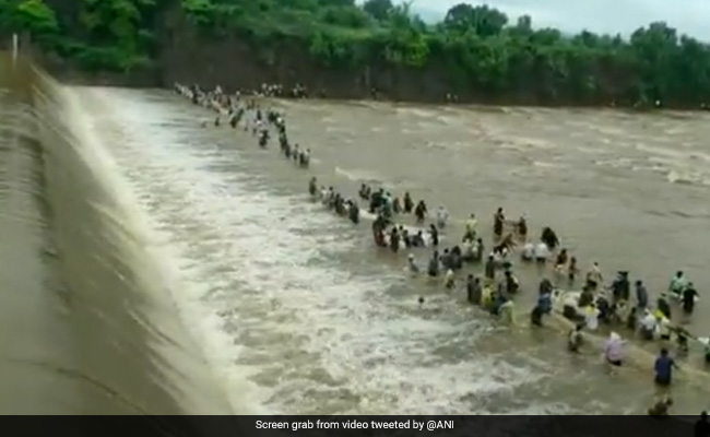 Video: People Fish Dangerously Close To Water Released From Maharashtra Dam