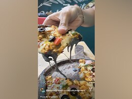 Mumbai's Bizarre Black Cheese Pizza Has Caught Our Attention