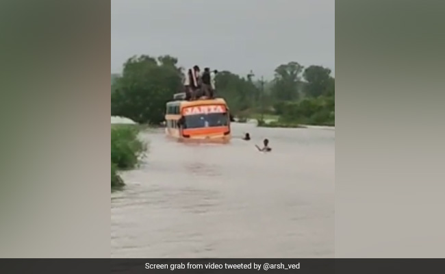 Cops Rescue 35 After Bus Gets Stuck On Flooded Bridge In Maharashtra