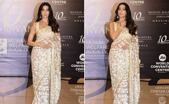 Nora Fatehi's Floral Ivory <i>Saree</i> Is The Definition Of Beauty In Simplicity