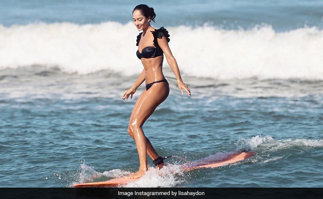 Pics From Lisa Haydon's Surfing Adventures In Bali