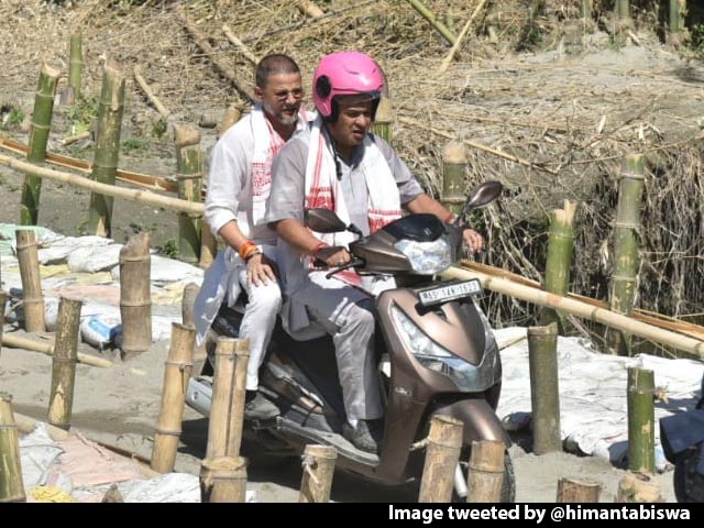 Assam Chief Minister Rides Scooter During Survey Of Flood-Hit Districts