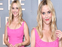 Reese Witherspoon Fabulously Pulls Off An Elle Woods In A Pleated Pink Number Reese Witherspoon Fabulously Pulls Off An Elle Woods In A Pleated Pink Number