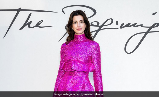 Anne Hathaway's Bright Pink Minidress Is A Glitter Party Just Waiting To Happen