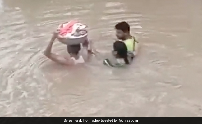 Viral Video Shows Toddler's <i>Baahubali</i>-Style Rescue In Flood-Hit Telangana