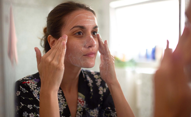 Washing face few times a day helps wash off acne-causing elements