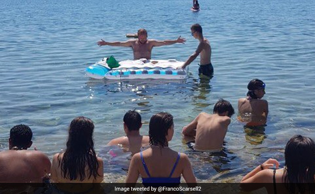 Italian Priest Holds Mass In The Sea With Inflatable Altar, Criticised
