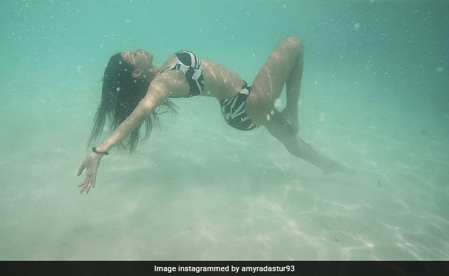 Amyra Dastur Looks Even More Stunning Underwater In A Black And White Swimsuit