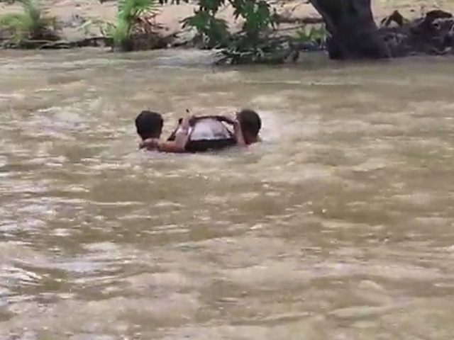 Video: Children Carried Inside Cooking Pot On Flooded Chhattisgarh River
