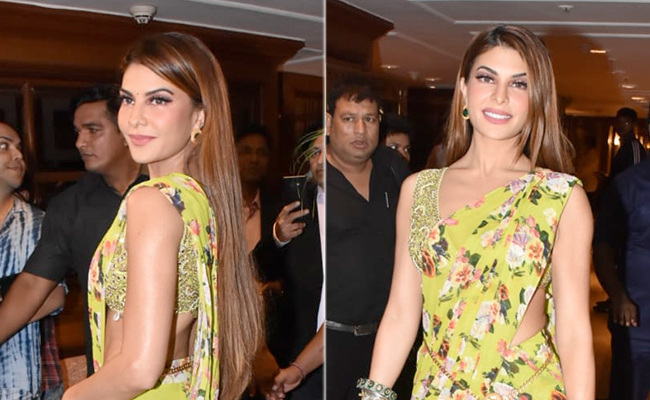 Jacqueline Fernandez Looks Like She Is In Full Bloom With Her Yellow Floral Printed <i>Saree</i>