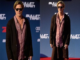 Yes, That Really Is Brad Pitt Wearing A Brown Skirt With Boots And Leg Tattoos On The Red Carpet Yes, That Really Is Brad Pitt Wearing A Brown Skirt With Boots And Leg Tattoos On The Red Carpet
