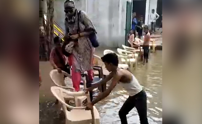 Video: UP Teacher Used Chairs To Enter School, Students Stood In Water