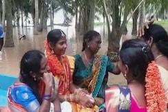 Video: Andhra Bride Takes Boat Ride To Groom's House Amid Heavy Rain Video: Andhra Bride Takes Boat Ride To Groom's House Amid Heavy Rain