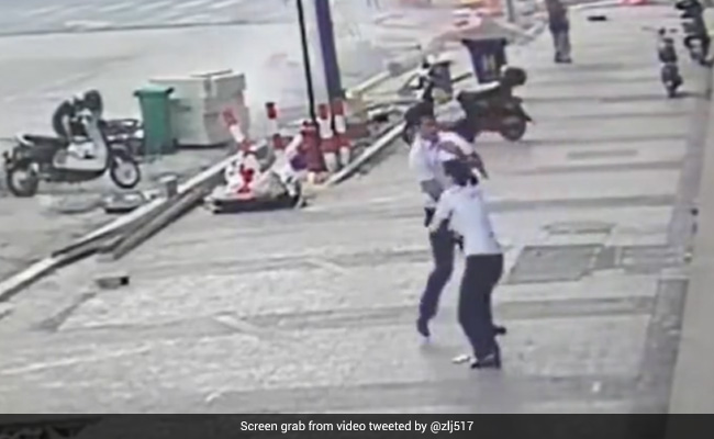 On Camera, Man Catches Two-Year-Old Girl After She Falls From Fifth Floor Window In China