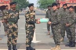 Indian, Pakistani Soldiers Exchange Sweets At Wagah Border On Eid Ul-Adha Indian, Pakistani Soldiers Exchange Sweets At Wagah Border On Eid Ul-Adha