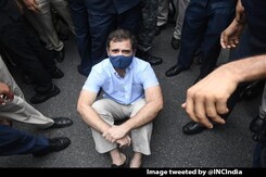 Rahul Gandhi, Surrounded By Cops, Sits On Road In Protest Against GST Rahul Gandhi, Surrounded By Cops, Sits On Road In Protest Against GST