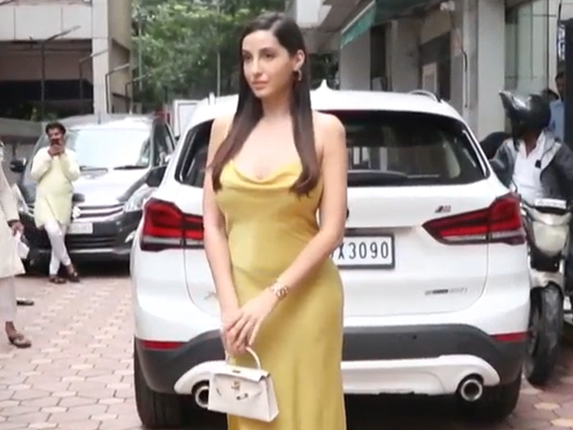 Nora Fatehi Turns Heads In A Yellow Satin Outfit