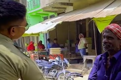 Viral: Cop Gifts Slippers To Cart Puller Walking Barefoot Viral: Cop Gifts Slippers To Cart Puller Walking Barefoot