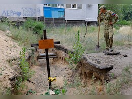 People In Ukraine Town Dig Up Hastily Buried Bodies For Proper Funeral