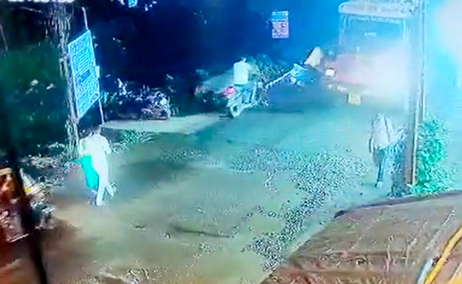 Video: Truck Runs Over Biker After He Loses Balance Due To Pothole
