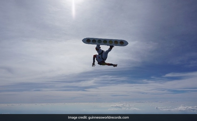 Watch: Man Breaks His Own Record Of Most Helicopter Spins While Skysurfing