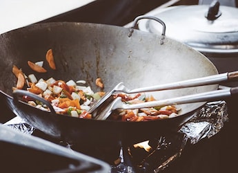 A Beginner's Guide To Choosing The Best Wok To Transform Your Stir-Fry A Beginner's Guide To Choosing The Best Wok To Transform Your Stir-Fry