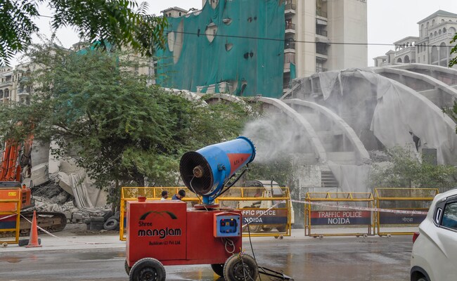 After Twin Towers Come Down, 500 Workers, 100 Tankers, 22 Anti-Smog Guns