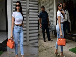 Nora Fatehi Colourblocks Her Way In A White Tee, Blue Jeans And A Fiery Orange Rs 8 Lakh Hermes Birkin Handbag Nora Fatehi Colourblocks Her Way In A White Tee, Blue Jeans And A Fiery Orange Rs 8 Lakh Hermes Birkin Handbag