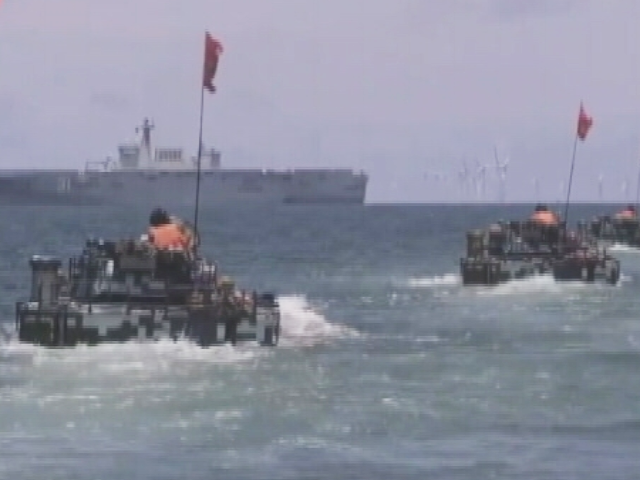 Videos Show Military Prep, Build-Up In China Amid Tension With Taiwan