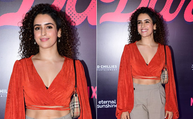Sanya Malhotra In An Orange Crop Top With A Burberry Bag And Abs On Display Makes It Hard To Take Our Eyes Off Her