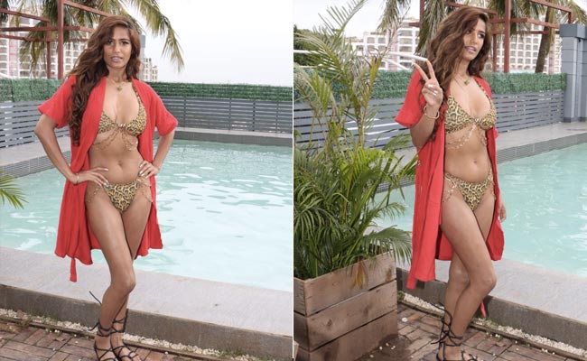 Poonam Pandey Steps On The Wild Side Simply With Her Leopard Printed Swim Set