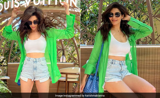 Karishma Tanna Is Living It Up In All Her Casual Chic Glory With Denim Shorts, Green Shirt, Crop Top