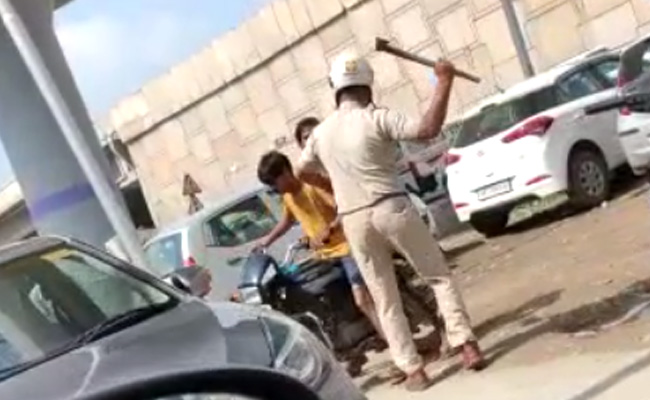 Watch: Haryana Cop With Axe Threatens, Kicks Bikers