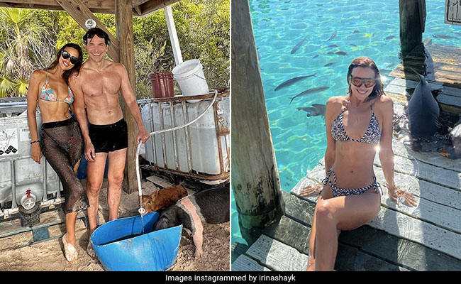 Irina Shayk Stuns On The Beaches Of The Bahamas In A Fabulous Patterned Swimsuit