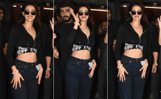 Disha Patani Goes Back To Her Spunky Roots In A Cropped Jacket And Flared Jeans With Sneakers