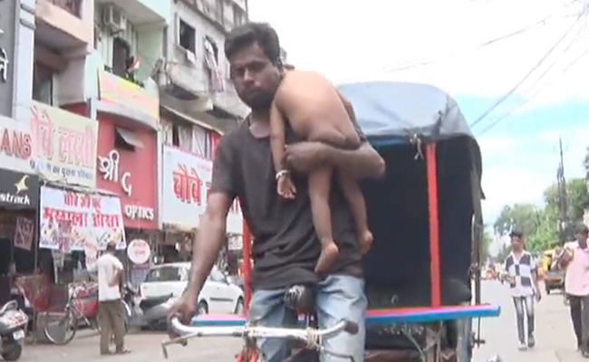 Baby In One Hand, Rickshaw In Other: Story Of Jabalpur Man Moves Internet