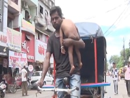 Baby In One Hand, Rickshaw In Other: Story Of Jabalpur Man Moves Internet Baby In One Hand, Rickshaw In Other: Story Of Jabalpur Man Moves Internet