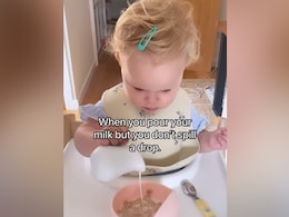 Viral: Baby Pours Milk For The First Time Without Spilling; Her Reaction Is Unmissable